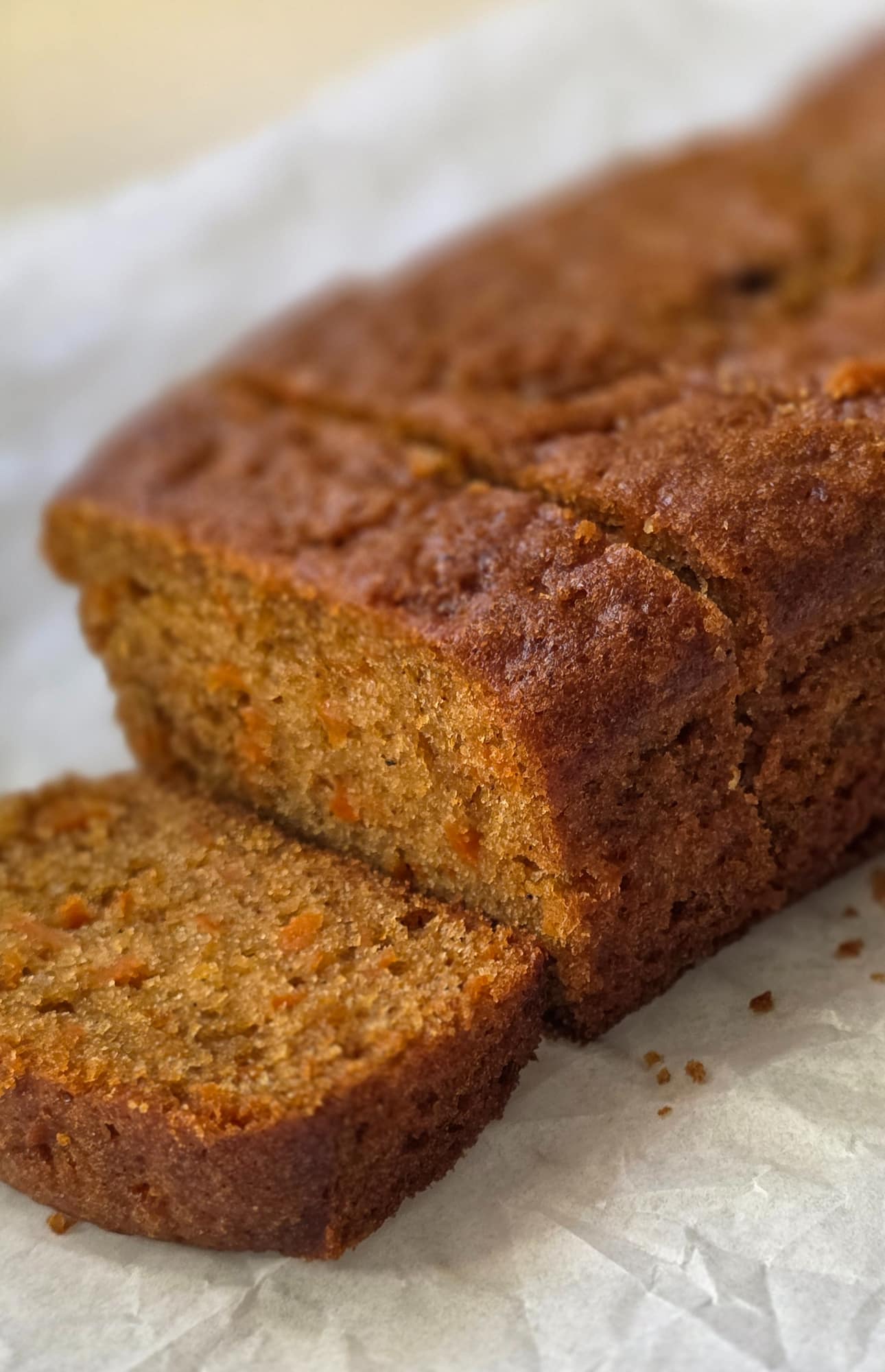 Sliced carrot loaf cake showing its tender crumb
